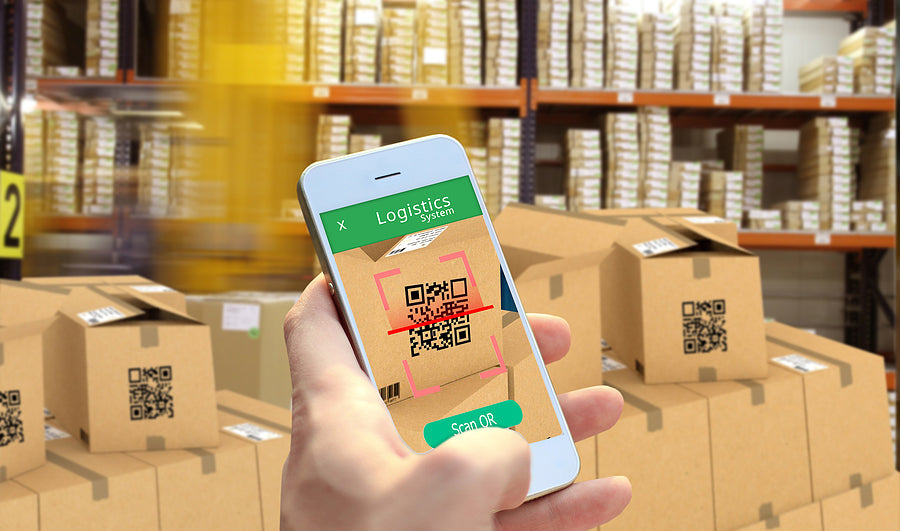  postal packaging - Smart-Phone-Scanning-Package-QR-Code-At-The-Package-Boxes